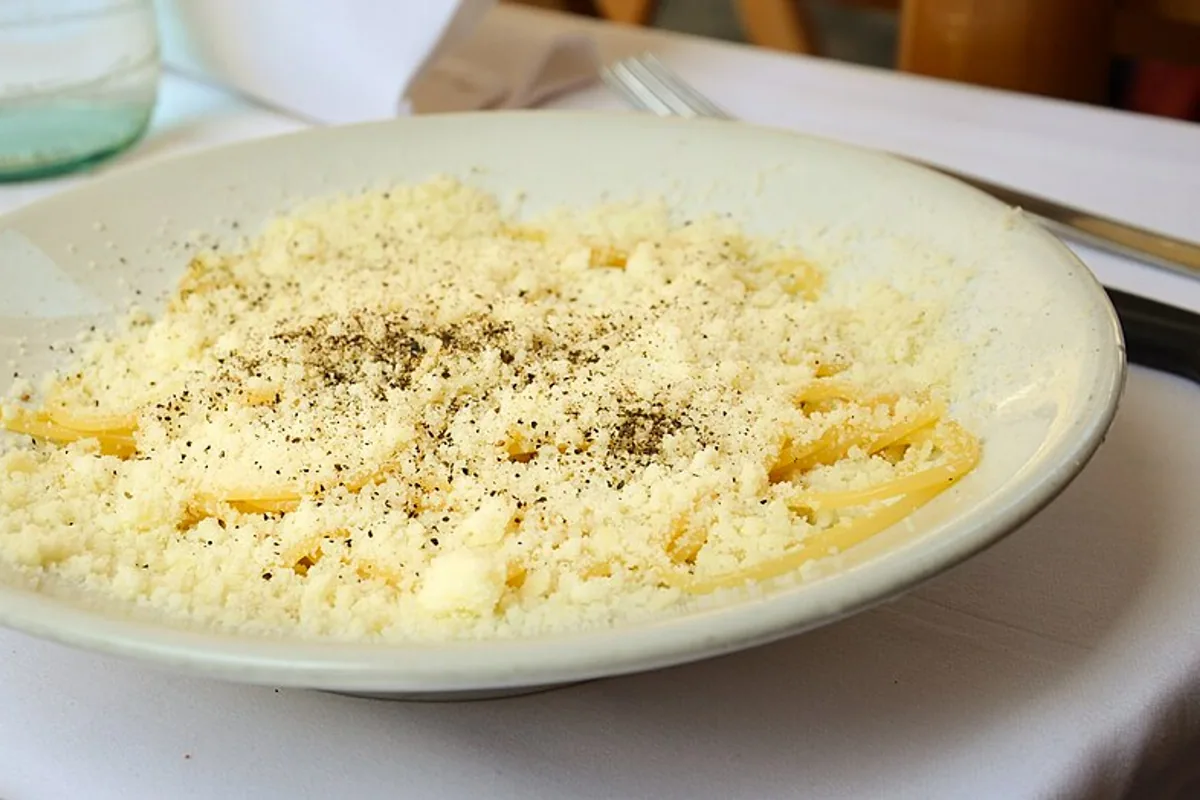 Spaghetti cacio e pepe with finely grated Pecorino and black pepper