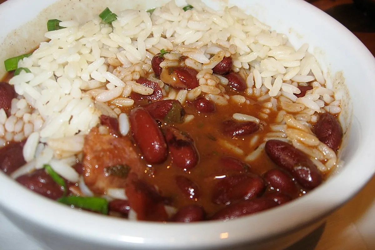 Kidney beans in a thick smoky sauce with white rice and scallions