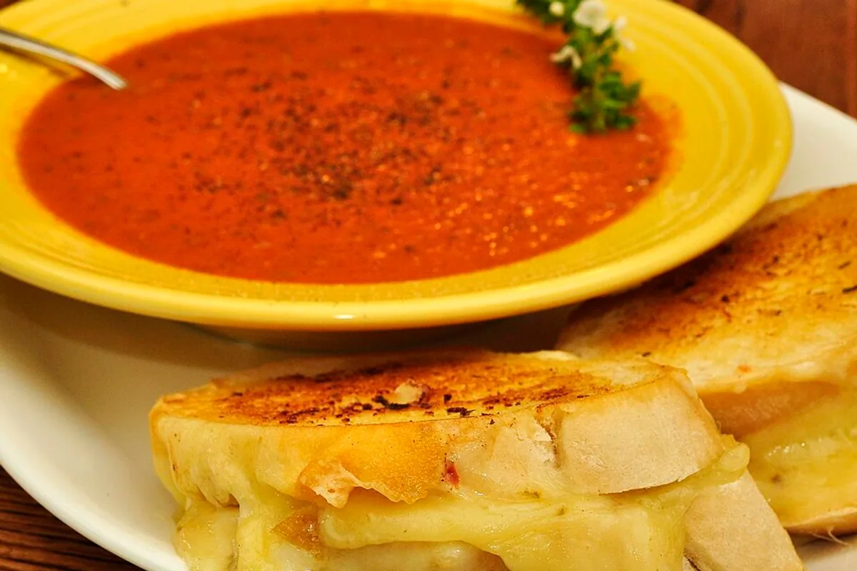 Roasted tomato soup with golden grilled cheese fingers